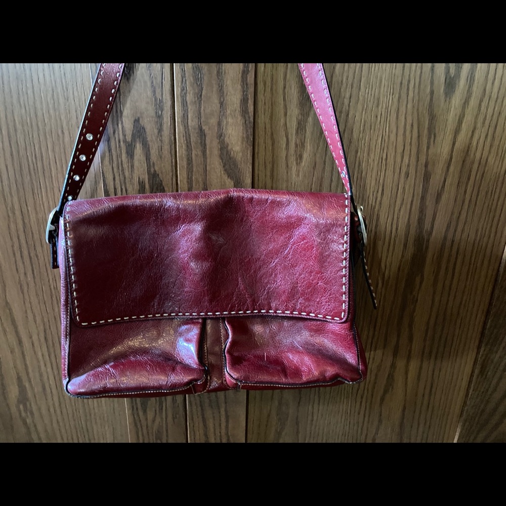 Scarlet with white accent stitching.